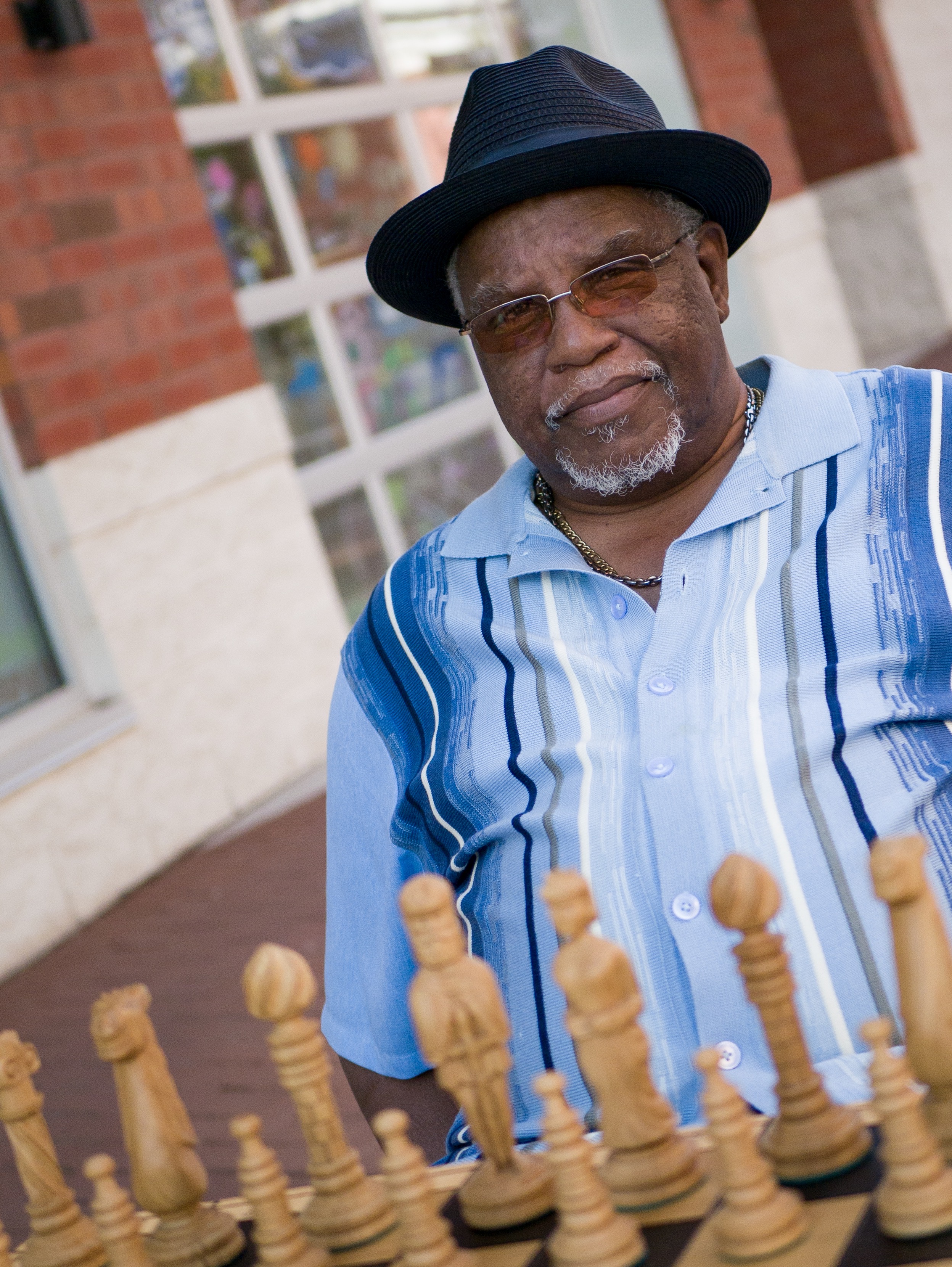 Man playing chess outdoors